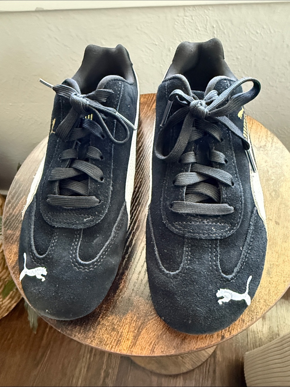 Puma Black Suede Sneakers with White Puma Logos